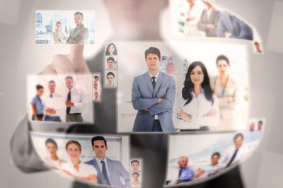 Concentrated businessman selecting a picture on digital screen