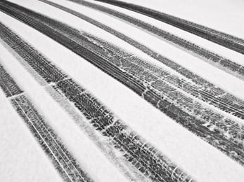 Tire tracks through snow